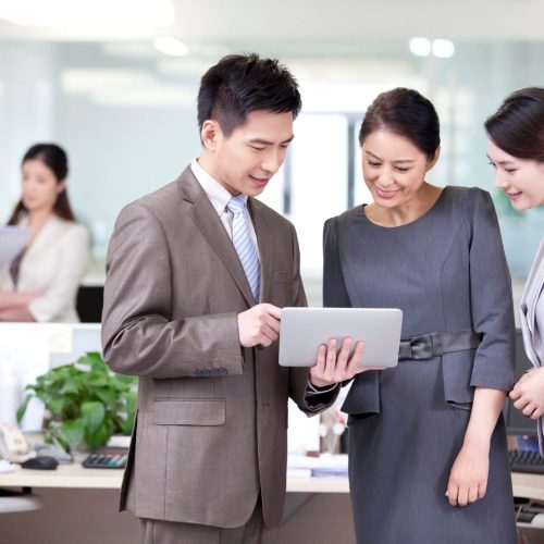 happy-business-colleagues-with-digital-tablet-2023-11-27-05-28-04-utc